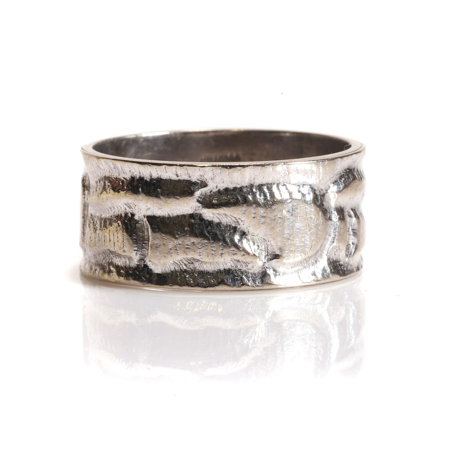 A 9ct white gold band ring, (1 of 2)