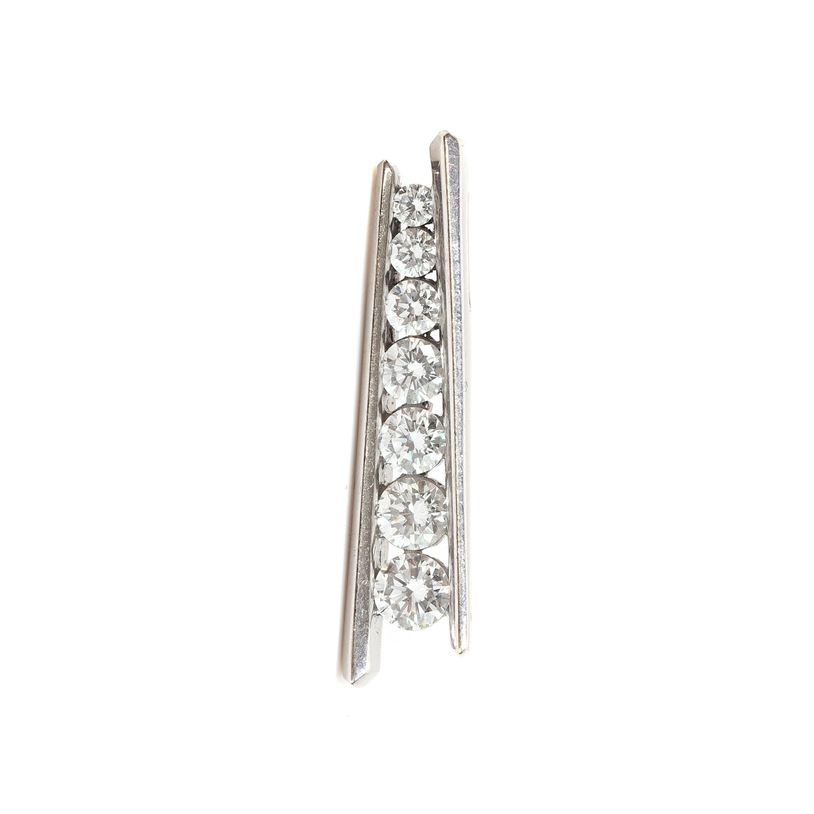 A diamond slider pendant,: A diamond slider pendant, featuring a line of graduated round brilliant cut diamonds, channel set between two knife-edge bars, stamped 750 and testing as approximately 18ct white gold (Length 2.8cm; 4