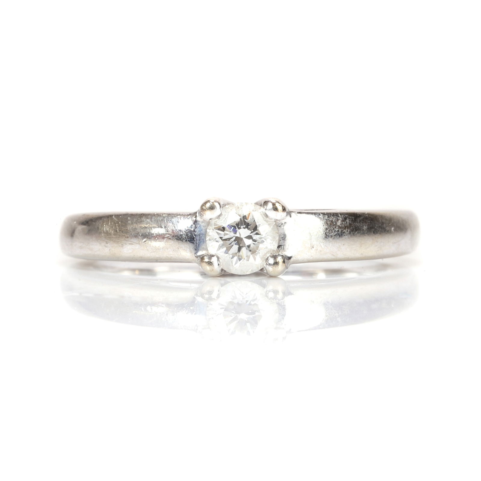 A white gold single stone diamond ring, (1 of 3)