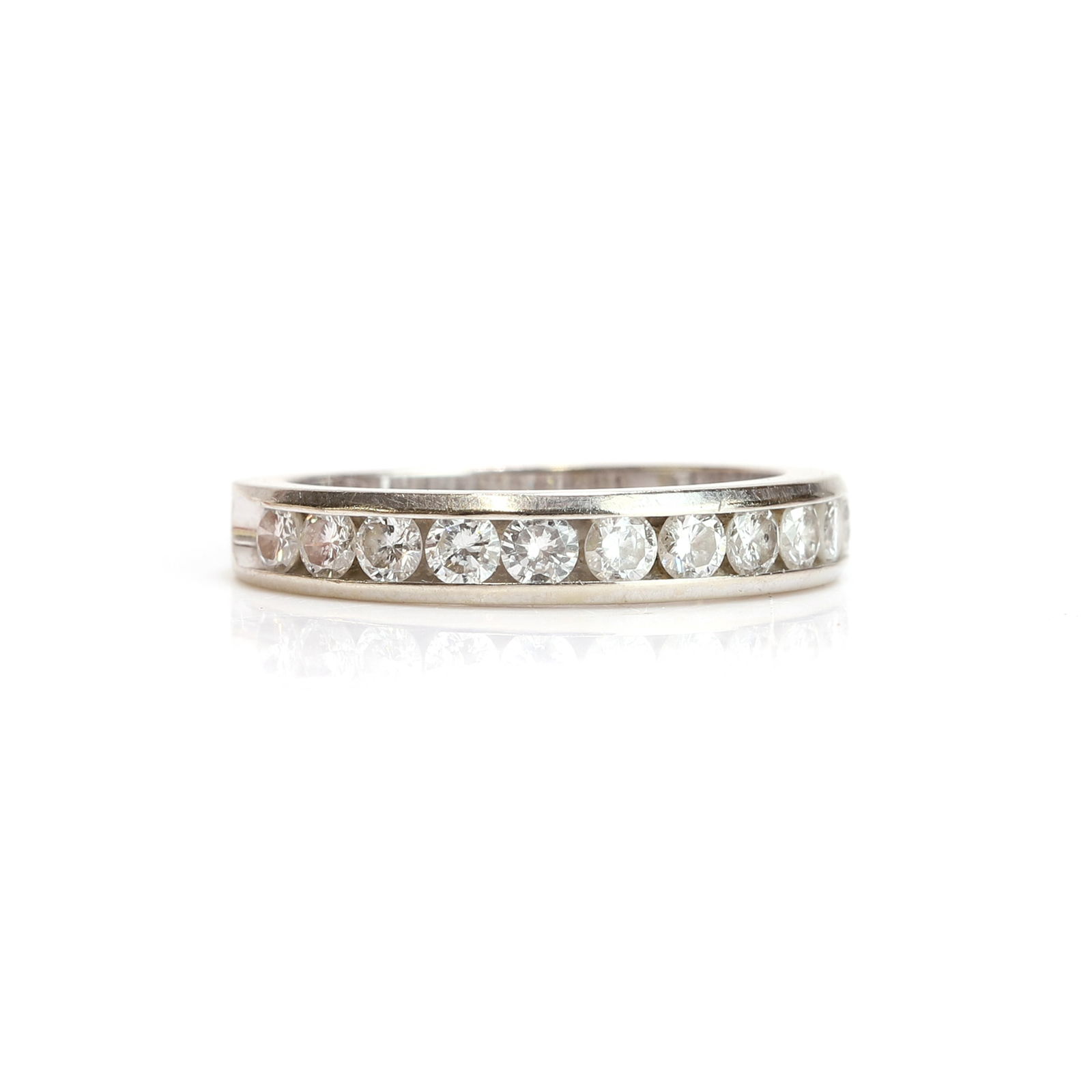 A diamond half eternity ring, (1 of 2)