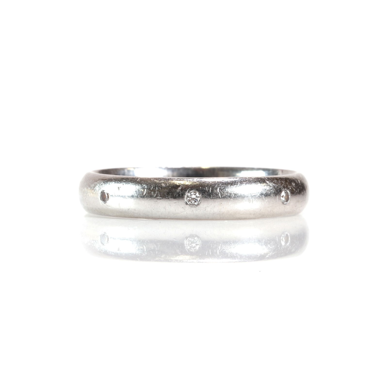 A platinum diamond wedding ring, (1 of 2)