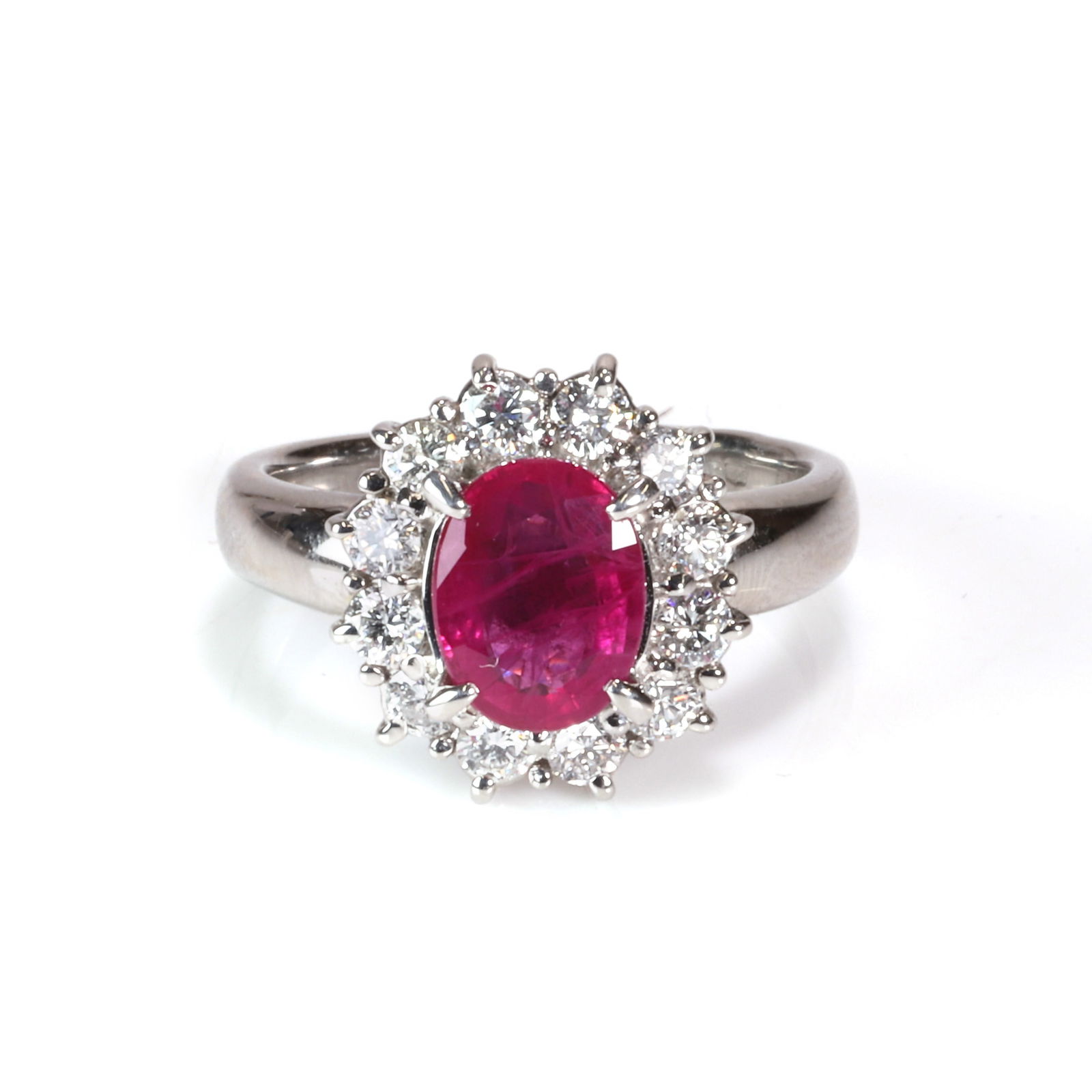 A platinum ruby and diamond cluster ring, (1 of 3)