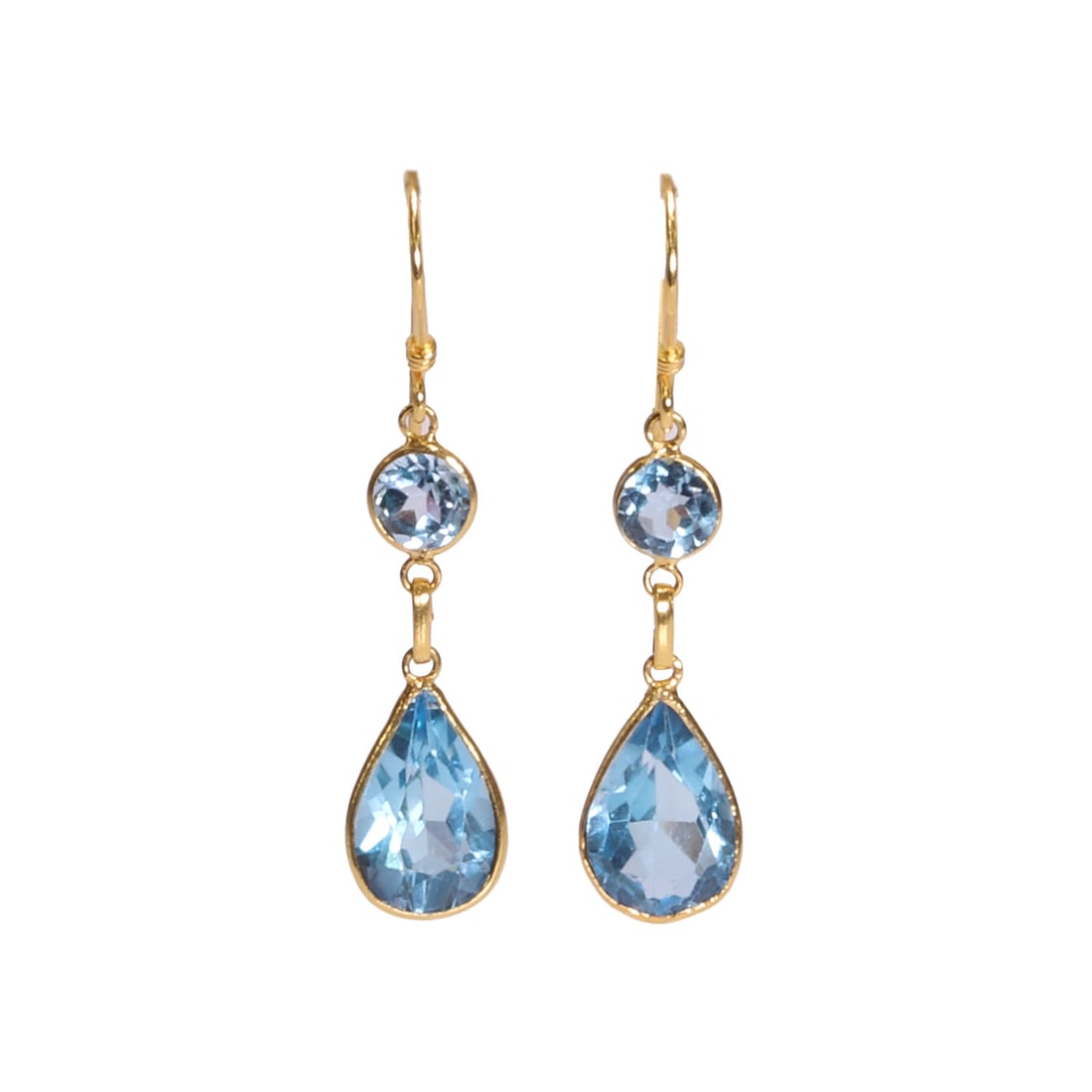 A pair of blue topaz drop earrings,: A pair of blue topaz drop earrings, each spectacle set with a pear cut blue topaz and a round cut blue topaz, articulated and to hook wire fittings, tested as approximately 14ct gold (Length 2.9cm;