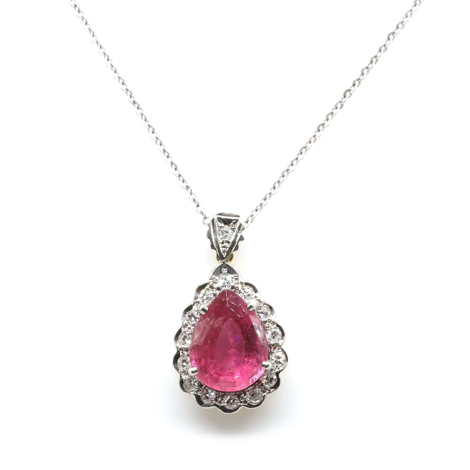 A pink tourmaline and diamond pendant and chain, (1 of 2)