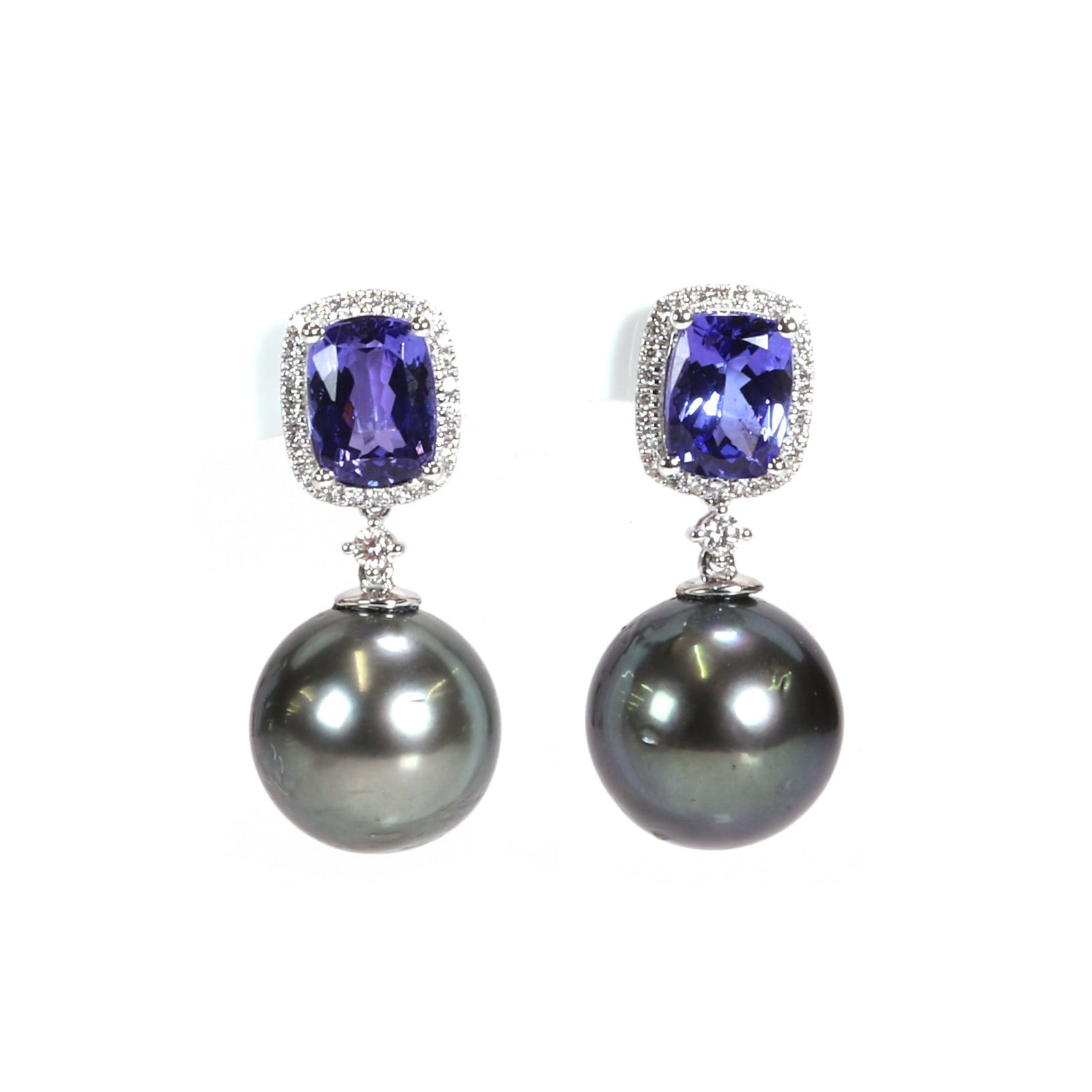 A pair of white gold tanzanite and cultured pearl drop earrings,: A pair of white gold tanzanite and cultured pearl drop earrings, each Tahitian pearl drop, untested, suspended by a single round brilliant cut diamond link, beneath a cushion-shaped Tanzanite and diam