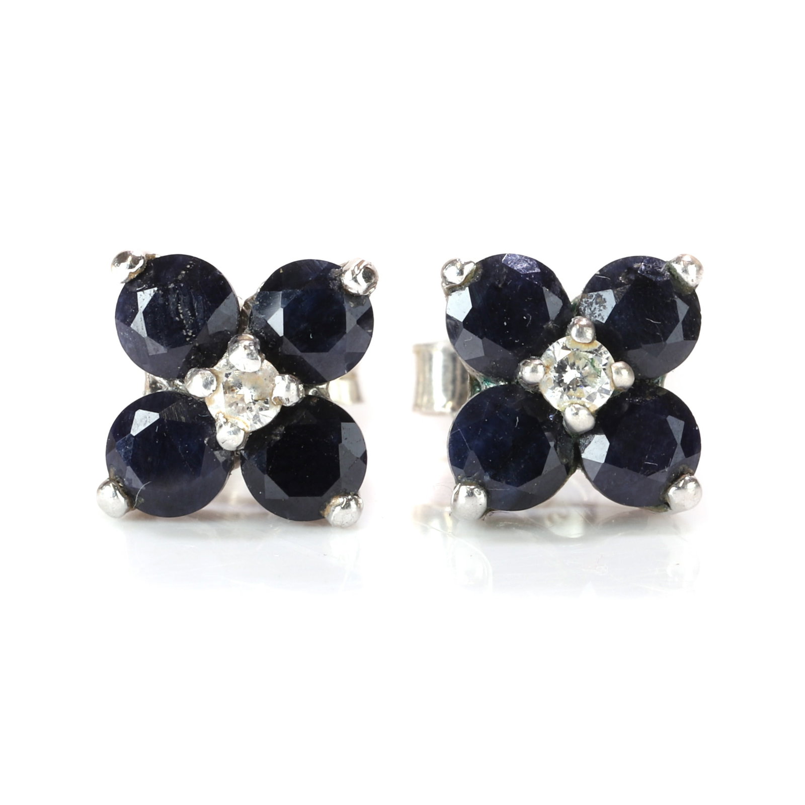 A pair of sapphire and diamond cluster stud earrings, (1 of 3)