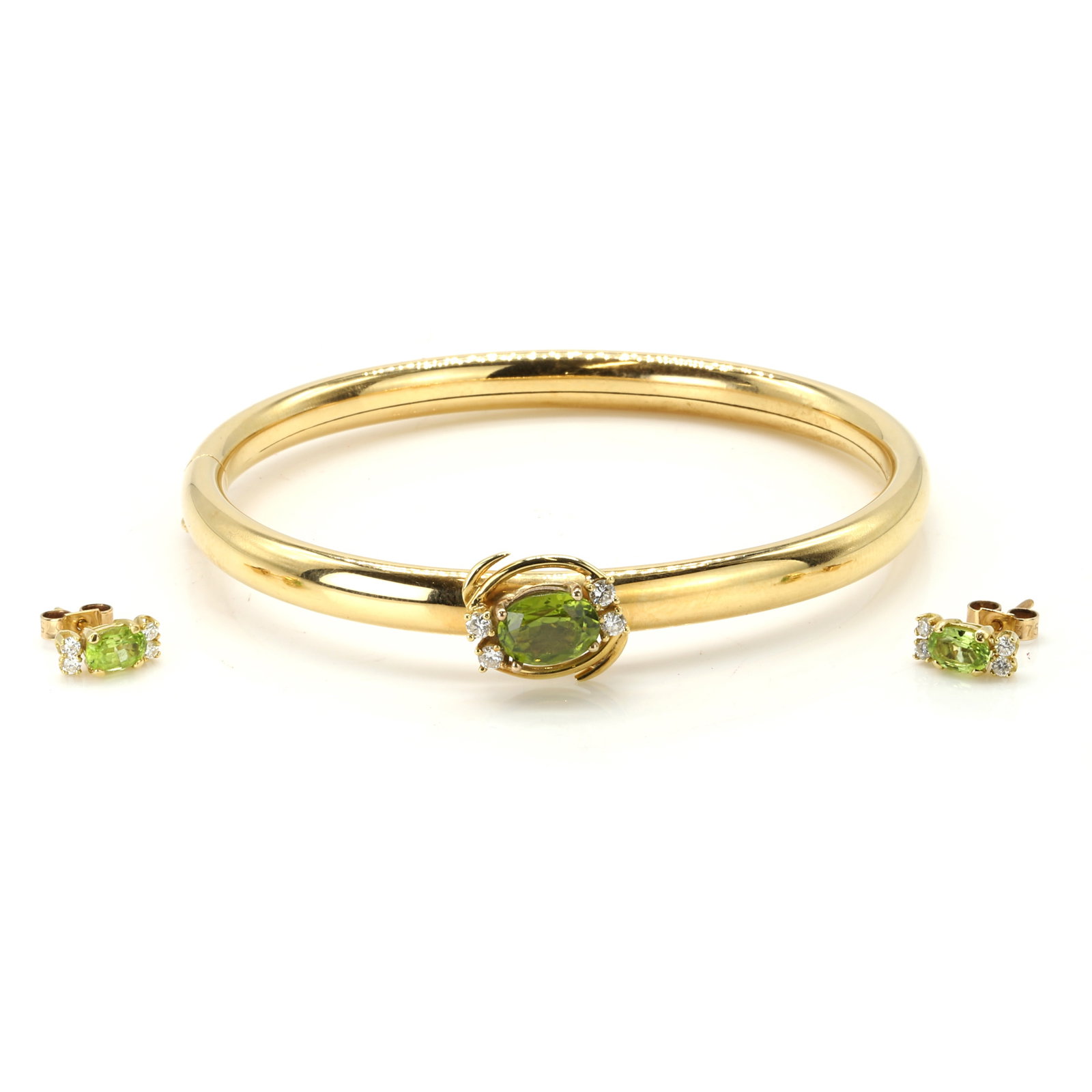 A gold peridot and diamond bangle and earring set, (1 of 3)