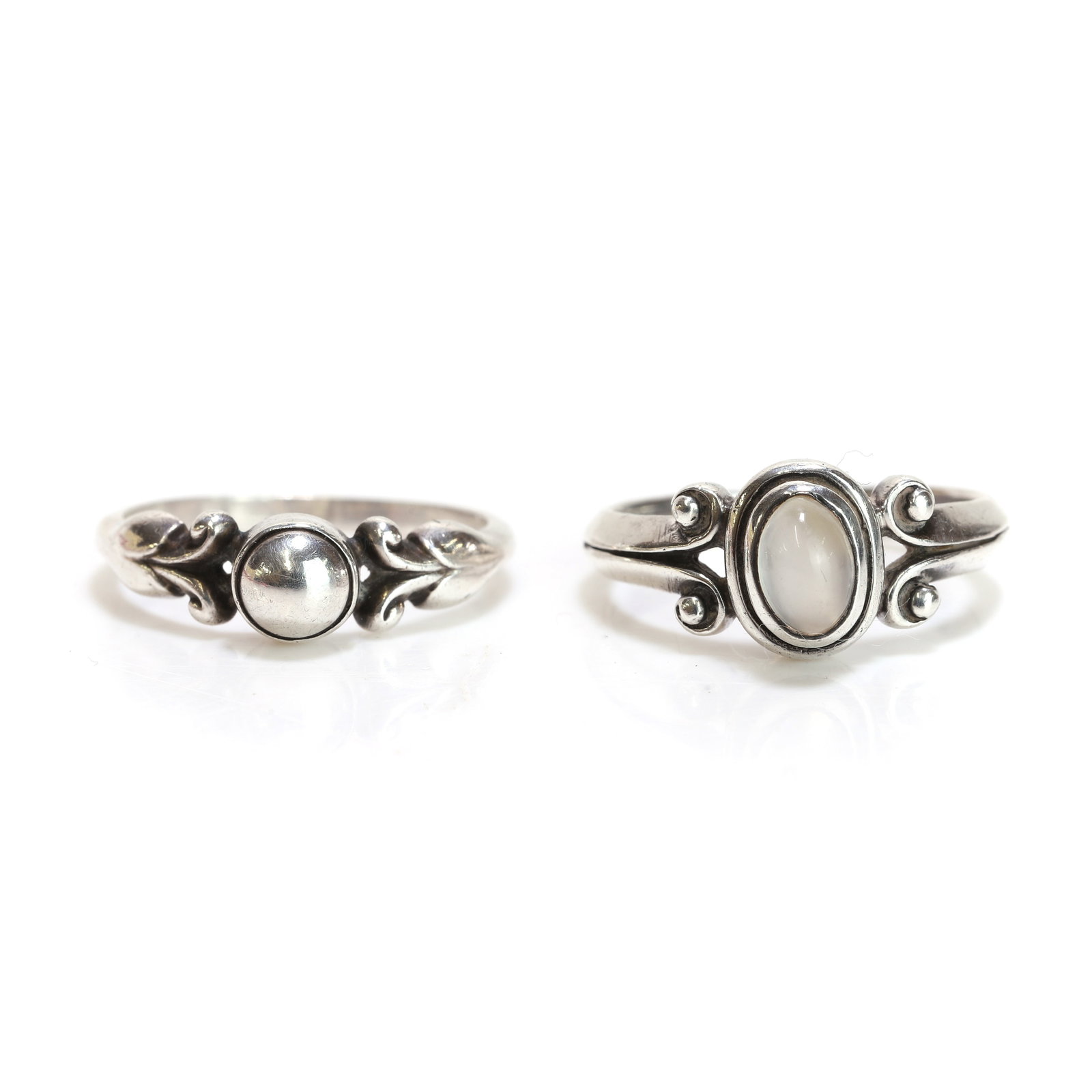 A Georg Jensen silver ring and a moonstone ring, (1 of 3)