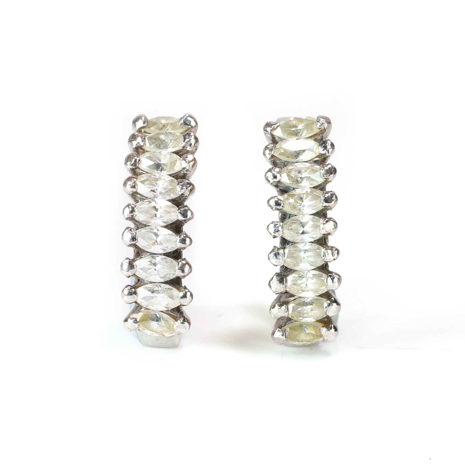 A pair of colourless stone half hoop earrings,: A pair of colourless stone half hoop earrings, each with a line of marquise shaped colourless stones, all claw set in white, to yellow post fittings, tested as approximately 18ct gold (Length 1.8cm; 5