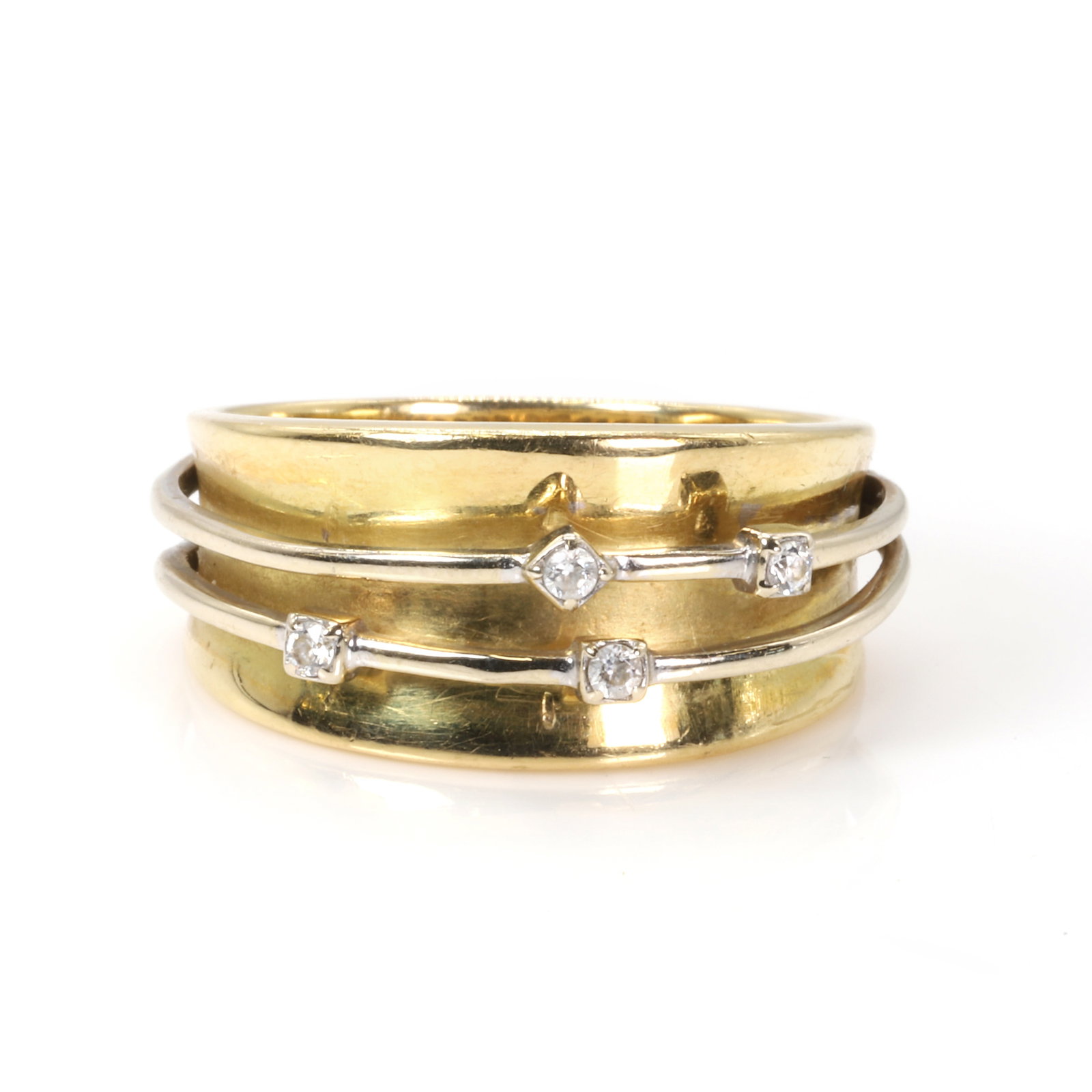 A two colour gold dress ring, (1 of 3)