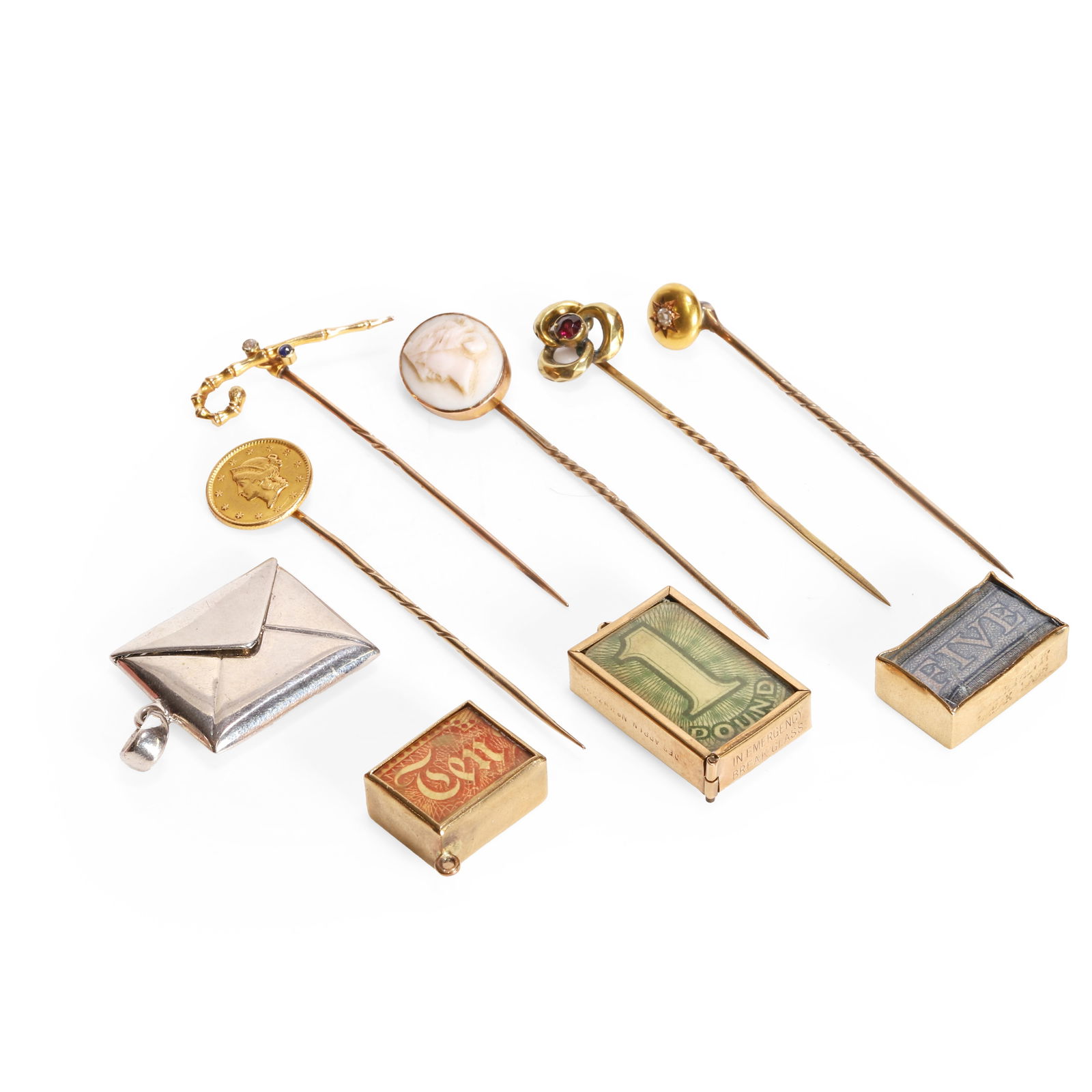 A collection of stick pins, charms and pendants, (1 of 1)
