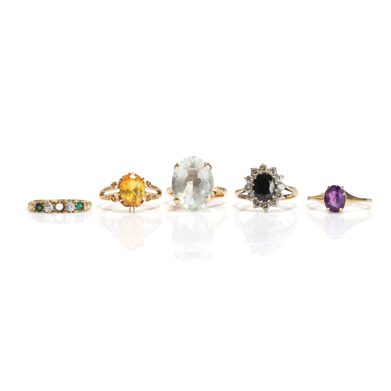 A group of five gemstone set rings, (1 of 5)