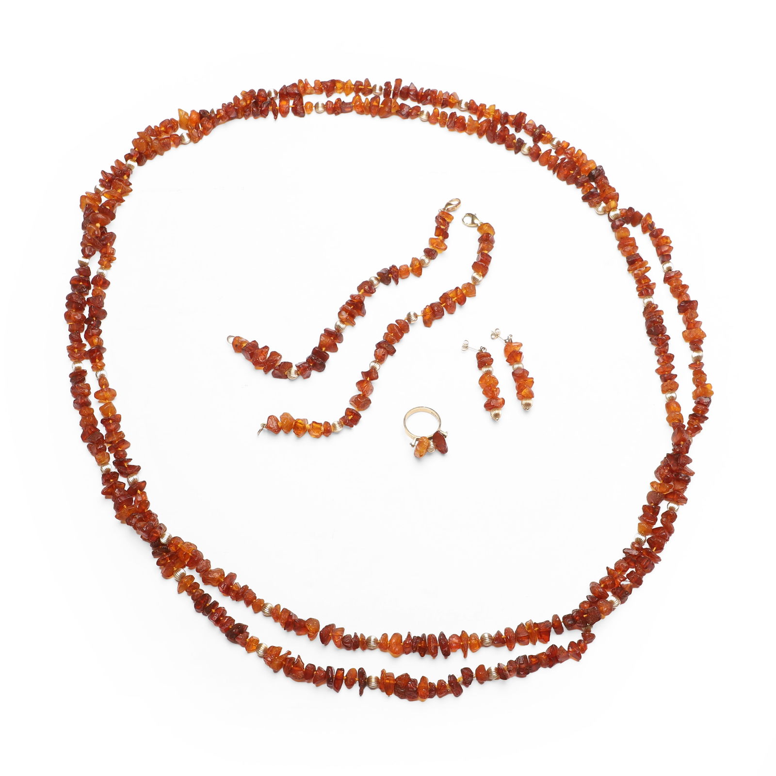 An amber and gold bead jewellery set,: An amber and gold bead jewellery set, comprising a single row raw freeform amber and gold bead necklace, strung knotted, a matching 9ct gold raw freeform amber bead ring, London 1993, and matching dro