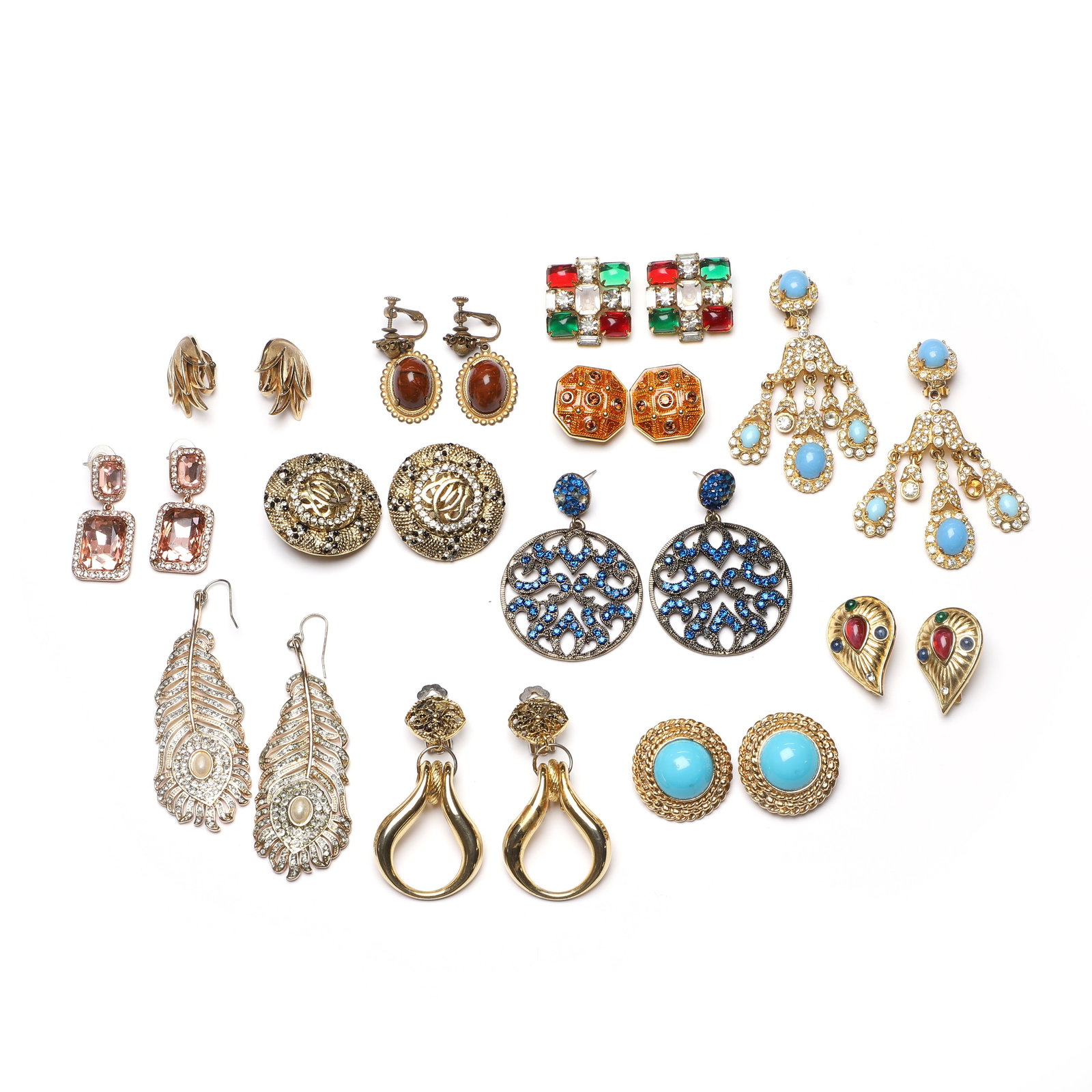A collection of vintage designer costume earrings,: A collection of vintage designer costume earrings, to include a pair of gold plated colourless paste and simulated turquoise drop clip earrings, a gold plated red and green paste cluster clip earrings