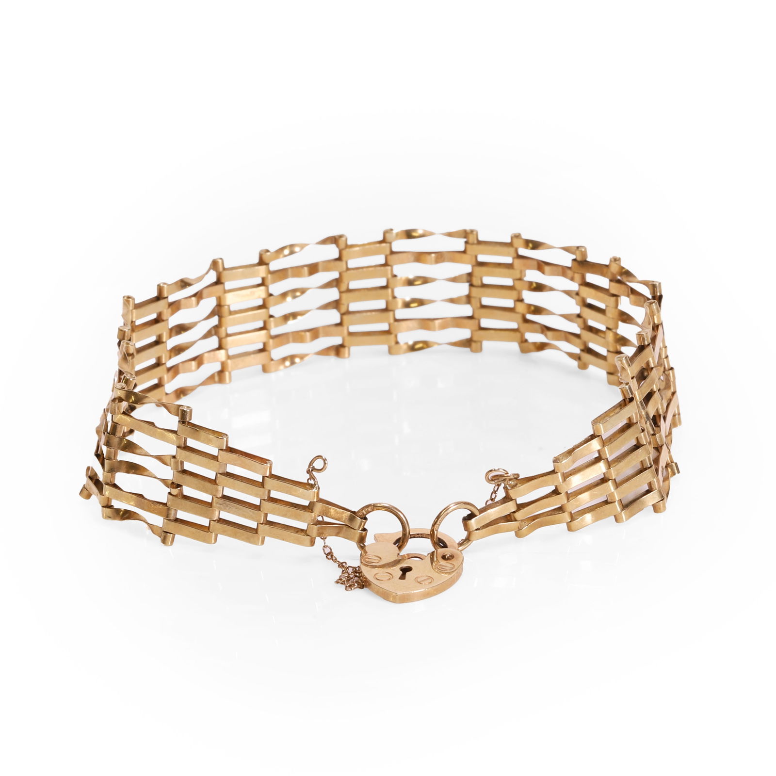 A 9ct gold gate bracelet, (1 of 2)