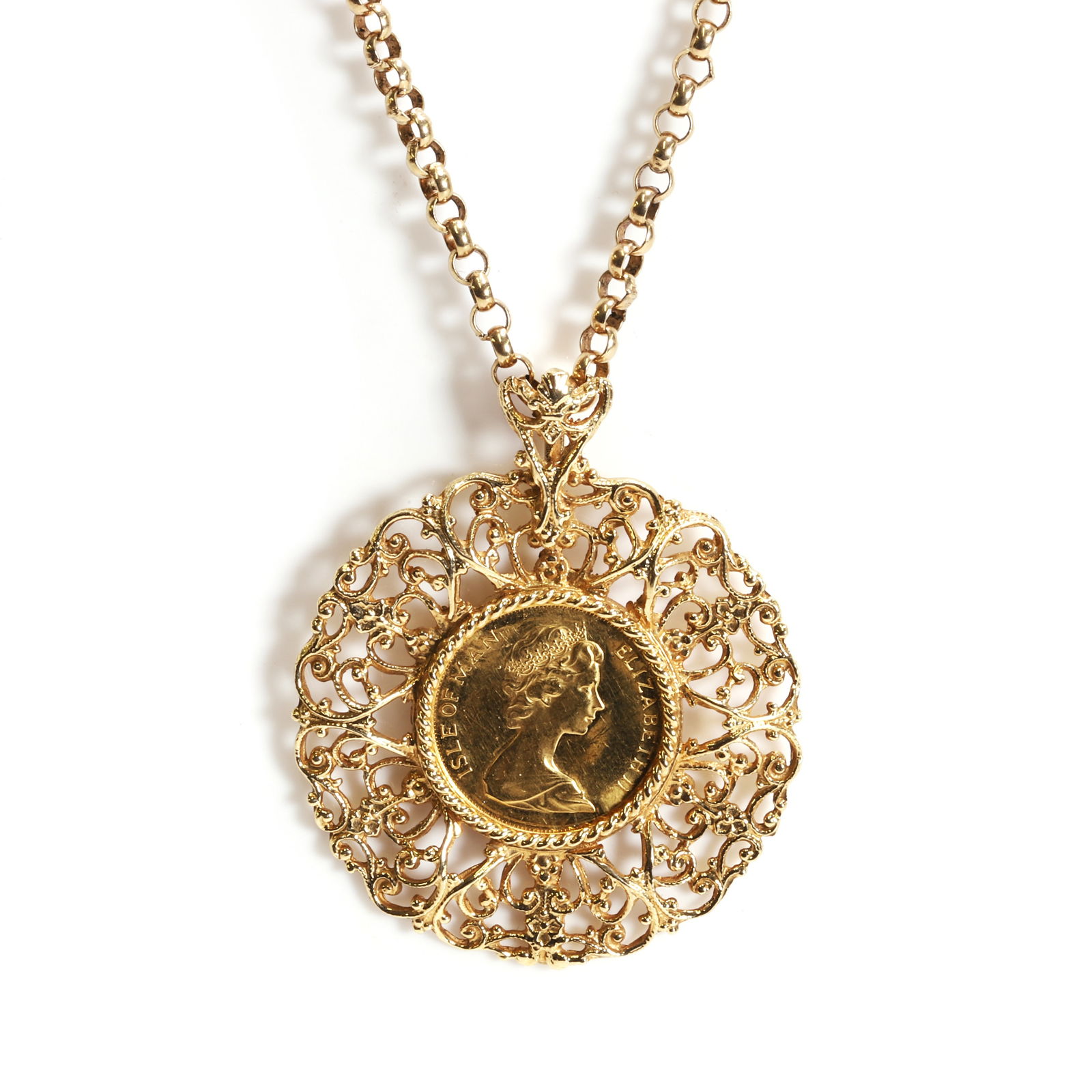 A half sovereign coin pendant,: A half sovereign coin pendant, the Elizabeth II half sovereign coin, dated 1979, spectacle set to a 9ct gold elaborate pierced mount, with wire twist detail and a fixed bale, London 1982, suspended by