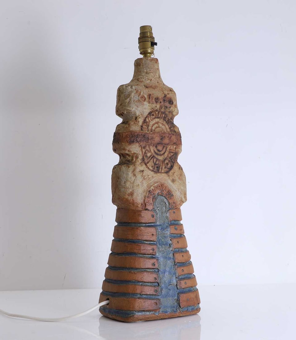 A Bernard Rooke ceramic lamp, Circa 1964,: A Bernard Rooke ceramic lamp, Circa 1964, with a shaped column decorated with geometric incised design 18cm wide, 55cm high Provenance: Certificate provided Condition Report: We cannot guarantee