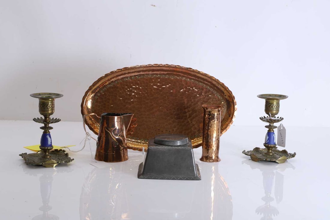 Collection of Aesthetic and Arts & Crafts metalware,: Collection of Aesthetic and Arts & Crafts metalware, comprising a Hugh Wallis pewter inkwell, a Herbert Dyer copper pitcher, a pair of brass and Jasperware candlesticks, with diamond registration