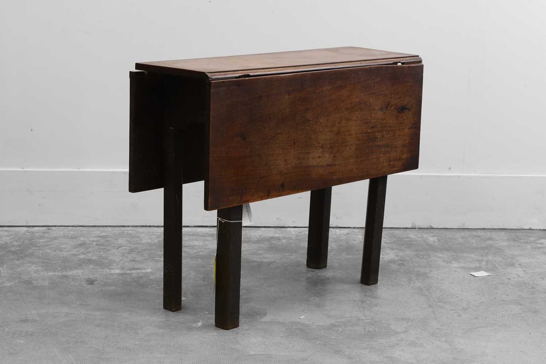 A George III mahogany drop leaf side table, Mid 18th century,: A George III mahogany drop leaf side table, Mid 18th century, raised on square legs, with double drop flap top 92.5cm wide, closed 33cm deep, open 98cm deep, 73cm high