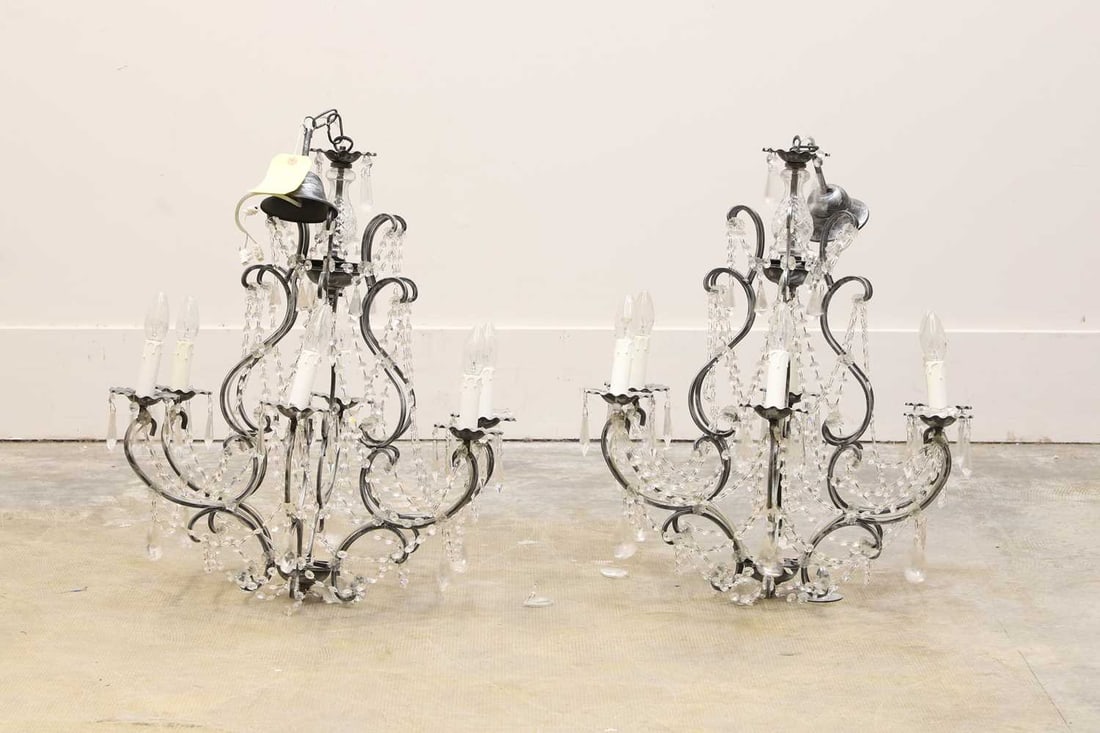 A pair of modern silvered chandeliers, Of modern manufacture,: A pair of modern silvered chandeliers, Of modern manufacture, each fitted with six scrolled branches, fitted with glass drops and mounts, 60cm diameter, 90cm high approx 2 Condition Report: Some
