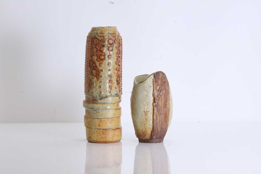 Two Bernard Rooke ceramics,: Two Bernard Rooke ceramics, a stoneware vase, with incised design, and four shaped holes to the top, stamped 'ROOKE', circa 1978, together with another stoneware vase, with dotted and ribbed