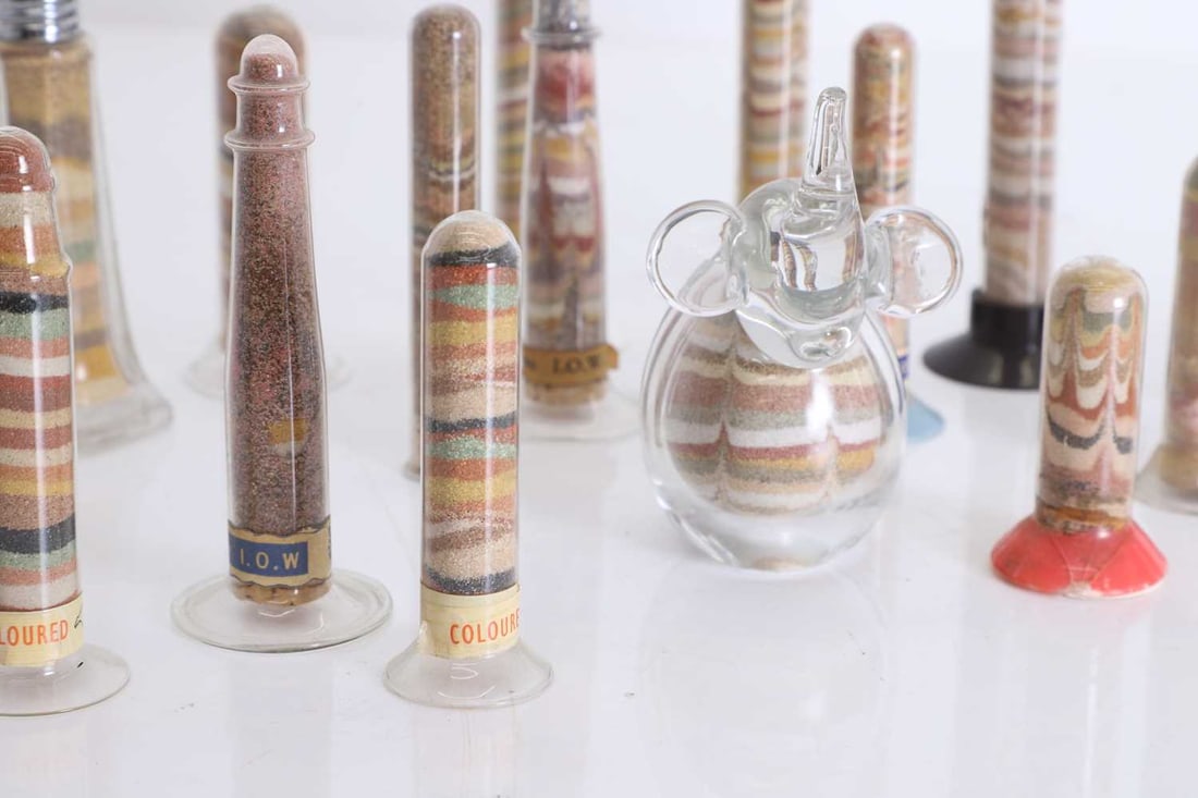 A collection of Isle of Wight coloured sand glass vessels, 20th century / 21st century, - 2