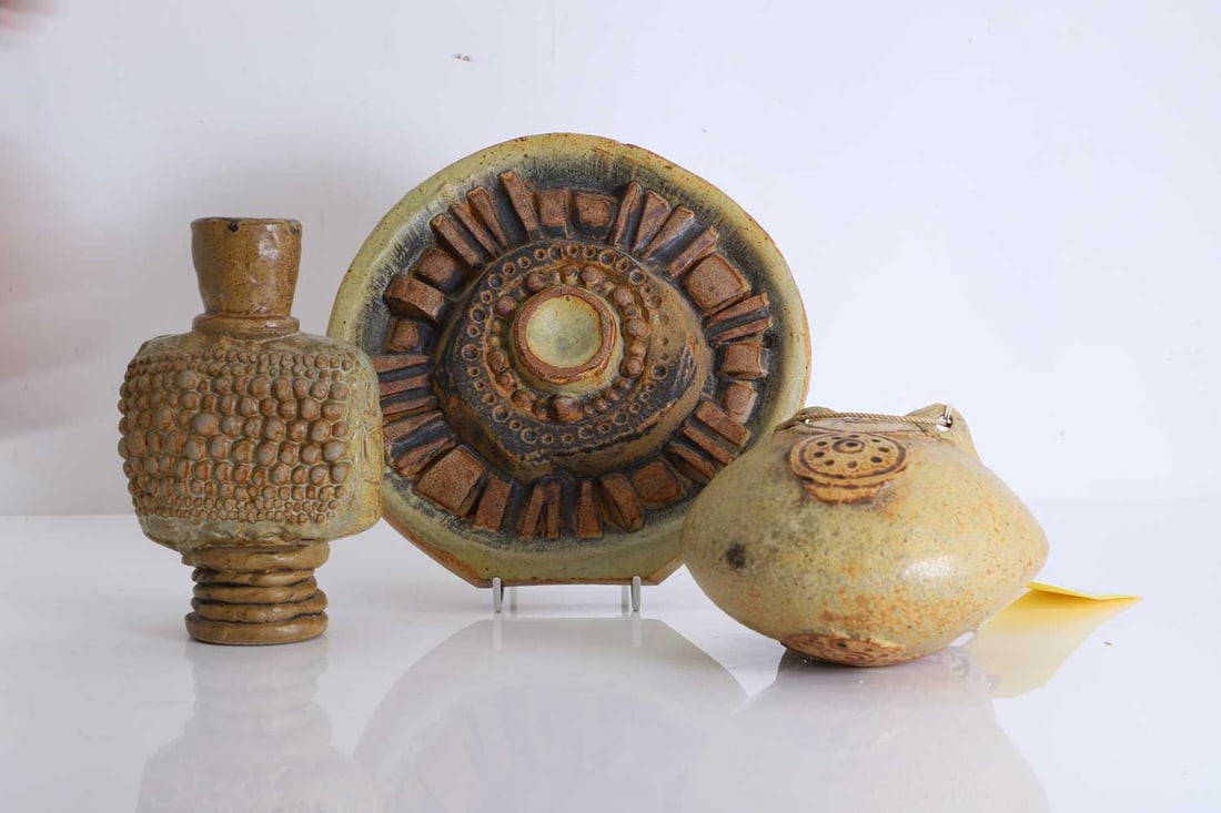 A collection of three Bernard Rooke ceramics,: A collection of three Bernard Rooke ceramics, to include a vase with dotted decoration on the main square shaped reserve, circa 1969, a stoneware circular plaque, with impressed design, circa