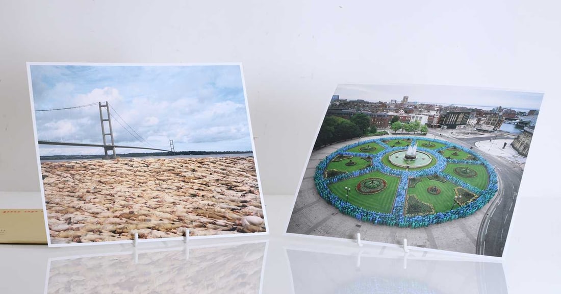 Two Spencer Tunick nude art installation photographs,: Two Spencer Tunick nude art installation photographs, both official participant photos for Sea of Hull and Humber Bridge events, with facsimile signature 20.2 x 25.2cm
