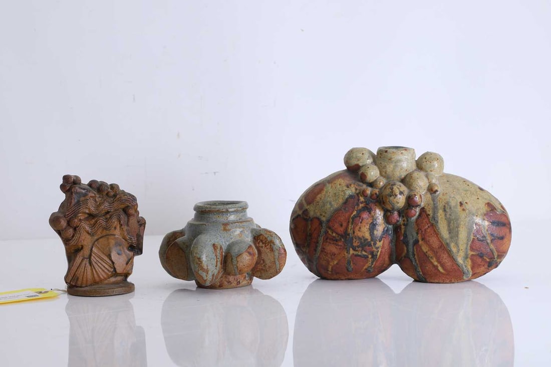 Three Bernard Rooke ceramic vases,: Three Bernard Rooke ceramic vases, To include an amorphous stoneware pot, circa 1972, with blue dripped glaze, with stamped mark to the base, a small stoneware sculpture, with shaped and waved