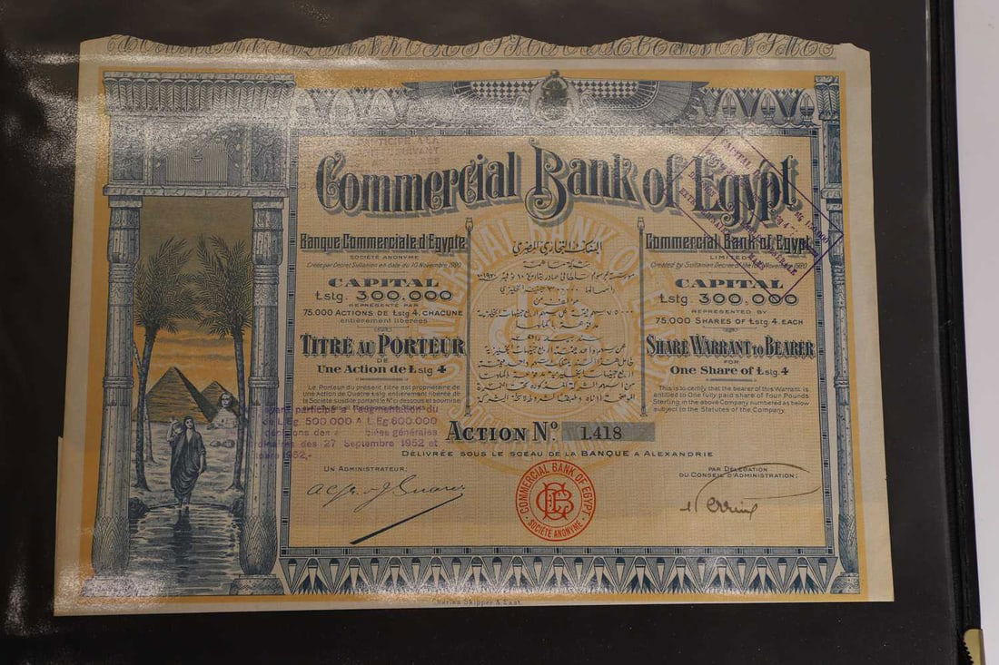 A collection of share certificates, - 4