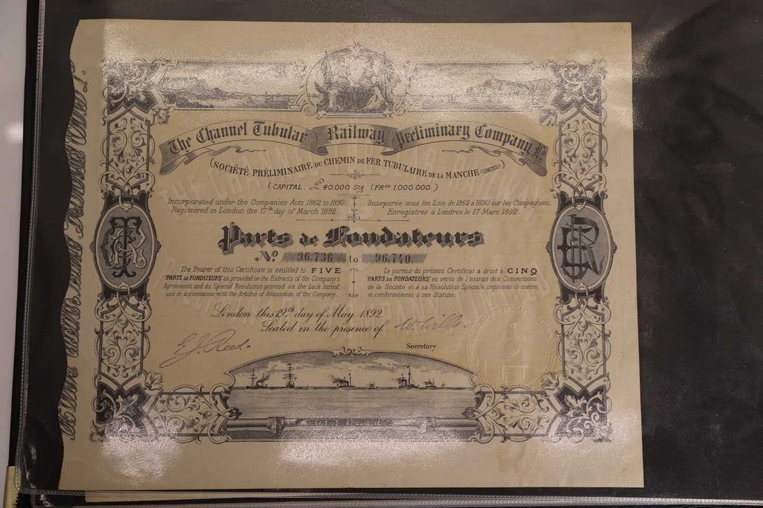 A collection of share certificates, - 5