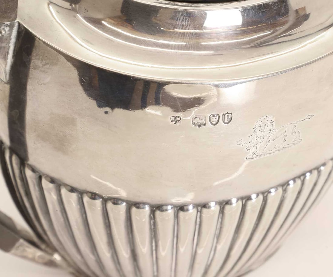 A silver teapot, - 2