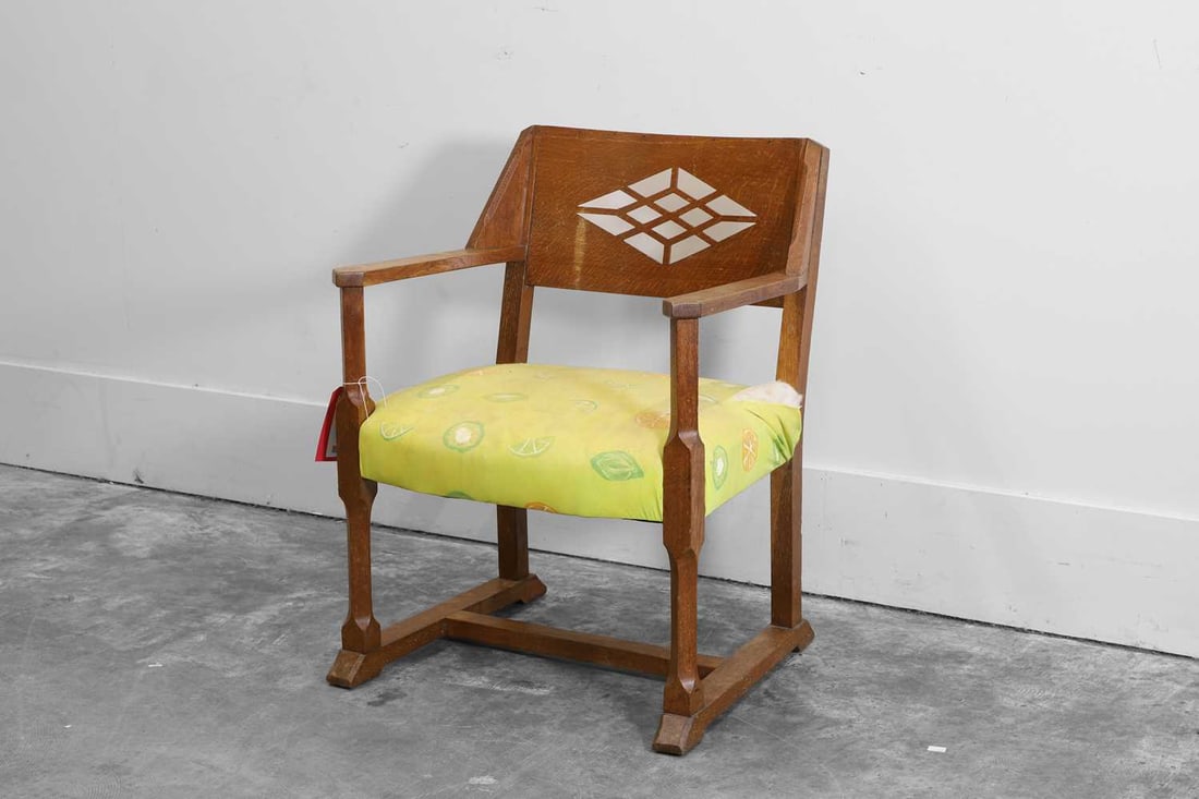 An Arts and Crafts oak library chair, c.1900, (1 of 2)