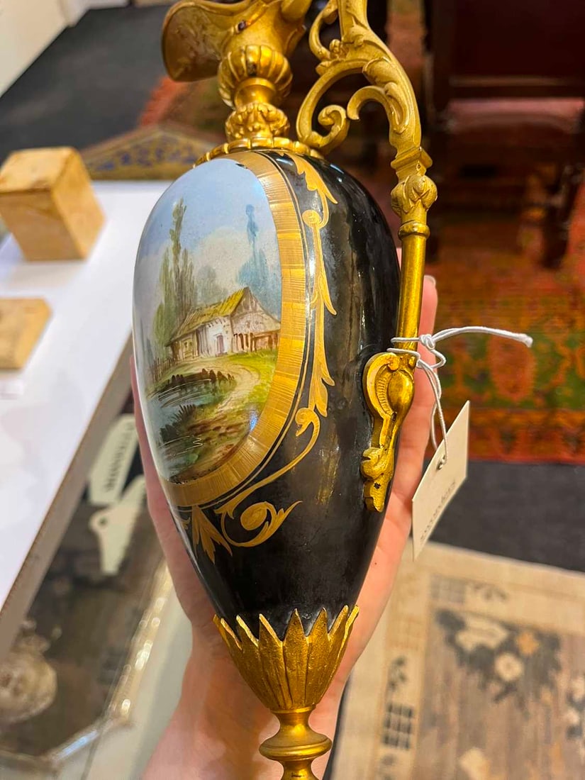 A pair of ormolu-mounted porcelain ewers, 19th century, - 12