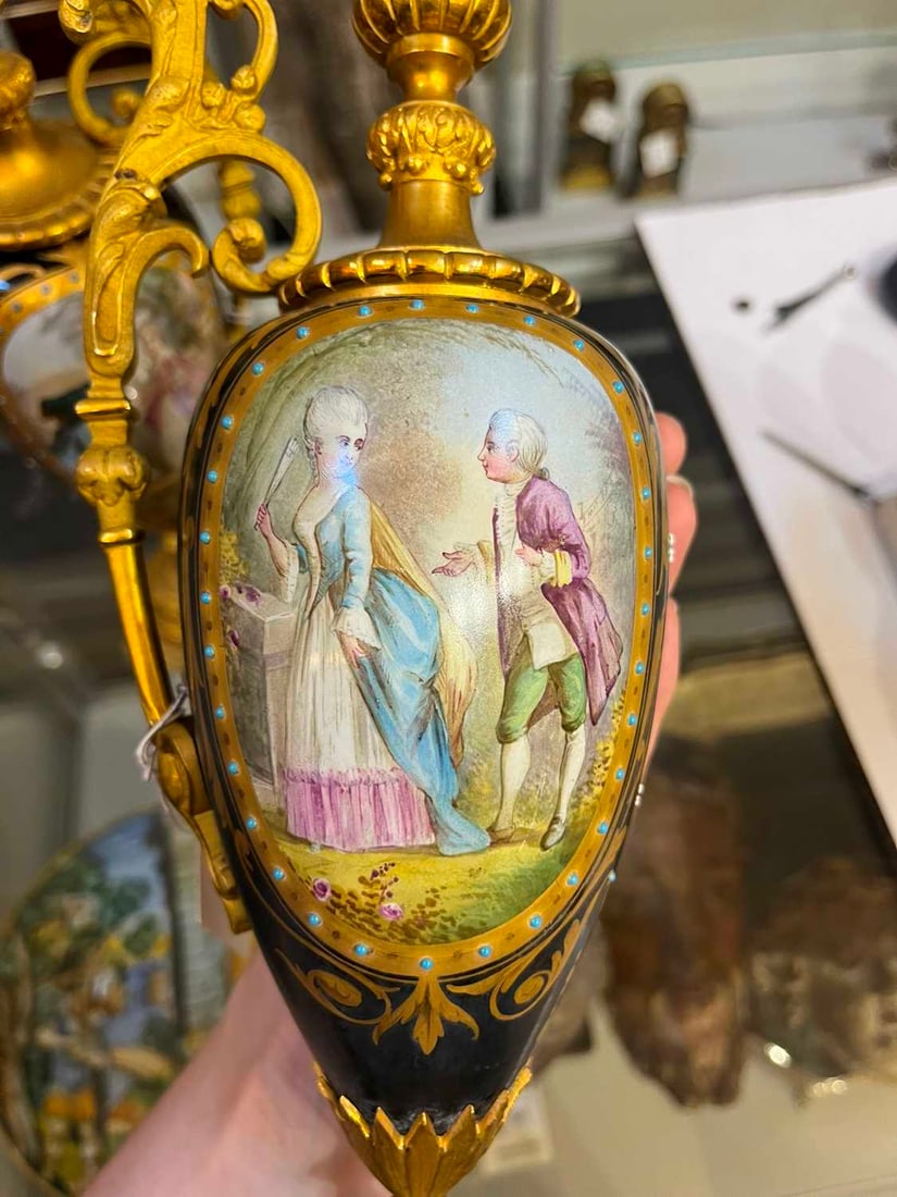 A pair of ormolu-mounted porcelain ewers, 19th century, - 13