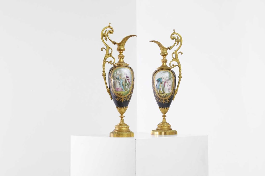 A pair of ormolu-mounted porcelain ewers, 19th century, - 5