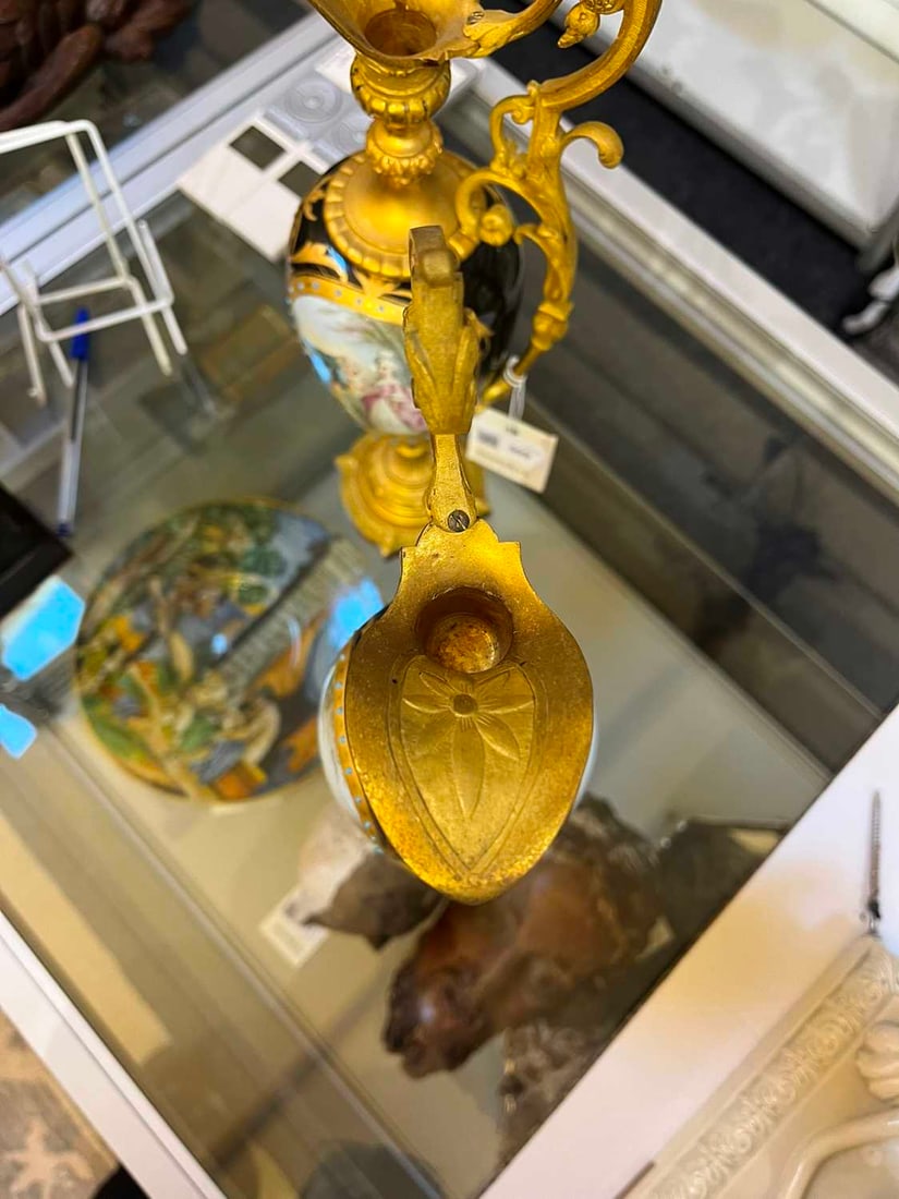 A pair of ormolu-mounted porcelain ewers, 19th century, - 7