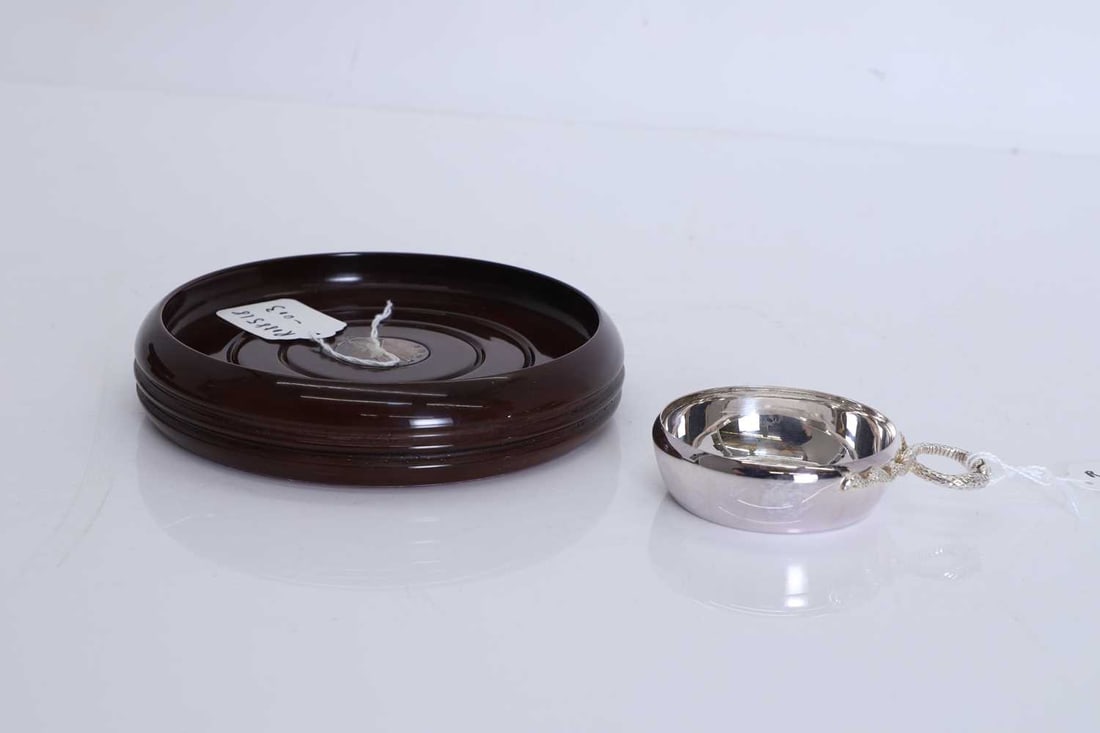 A wooden and silver wine coaster by Piers Hart, (1 of 1)
