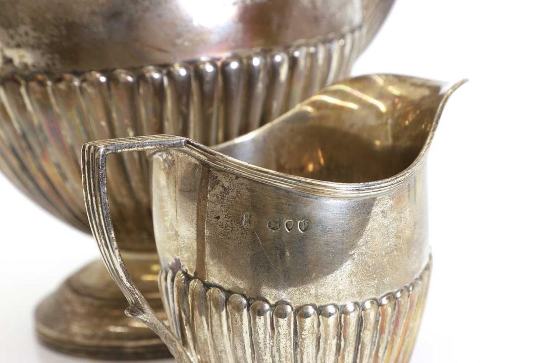 A Victorian silver coffee pot and creamer, - 4