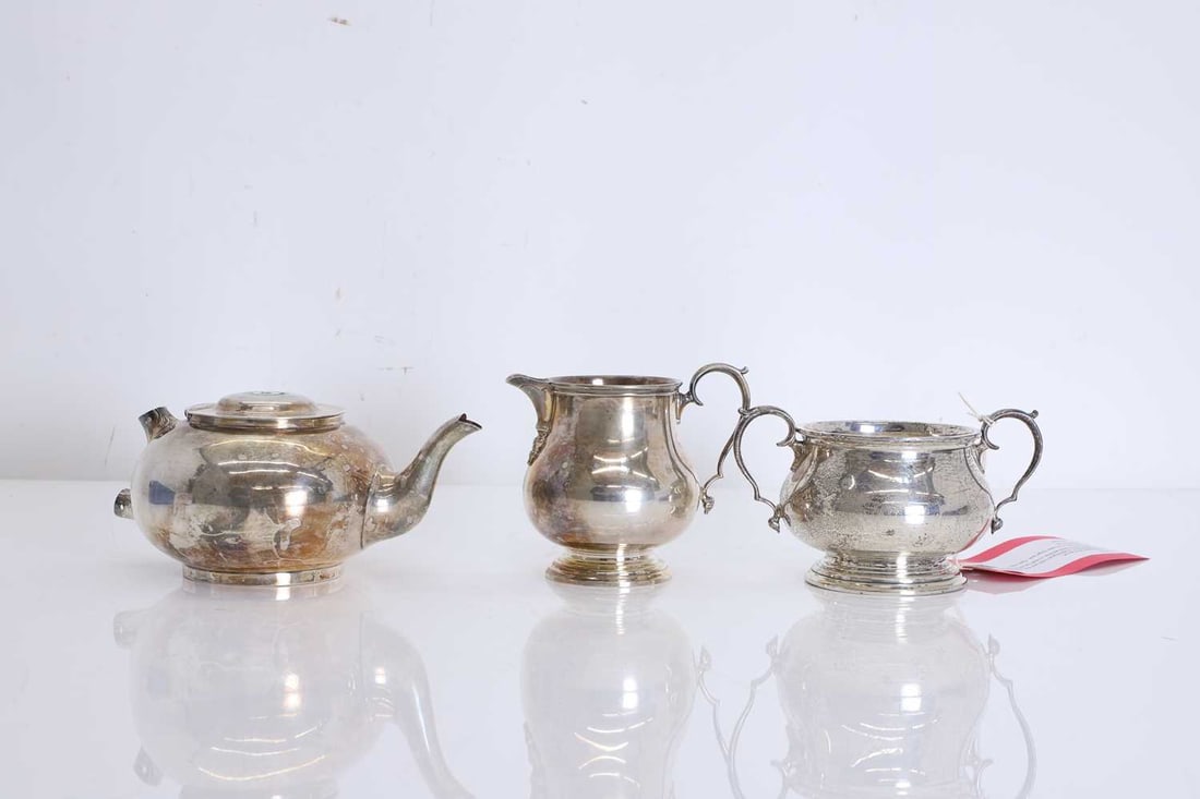 A three-piece silver tea set, (1 of 1)