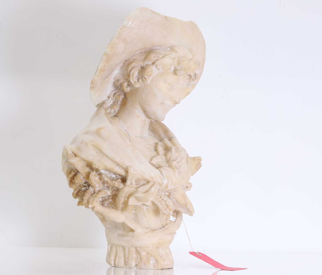 Professor Giuseppe Bessi (Italian, 1857-1922) An alabaster bust of a girl wearing a hat, inscribed ' (1 of 1)