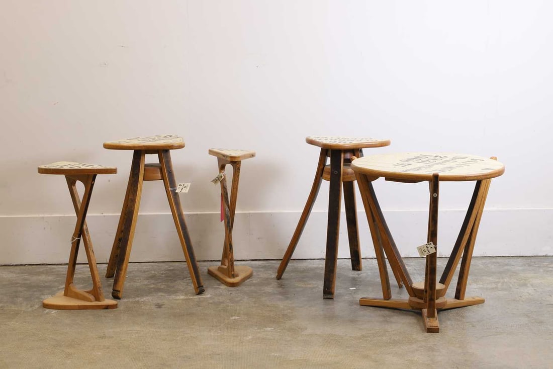 A graduated set of five whisky tavern tables and stools, Of recent manufacture, (1 of 2)