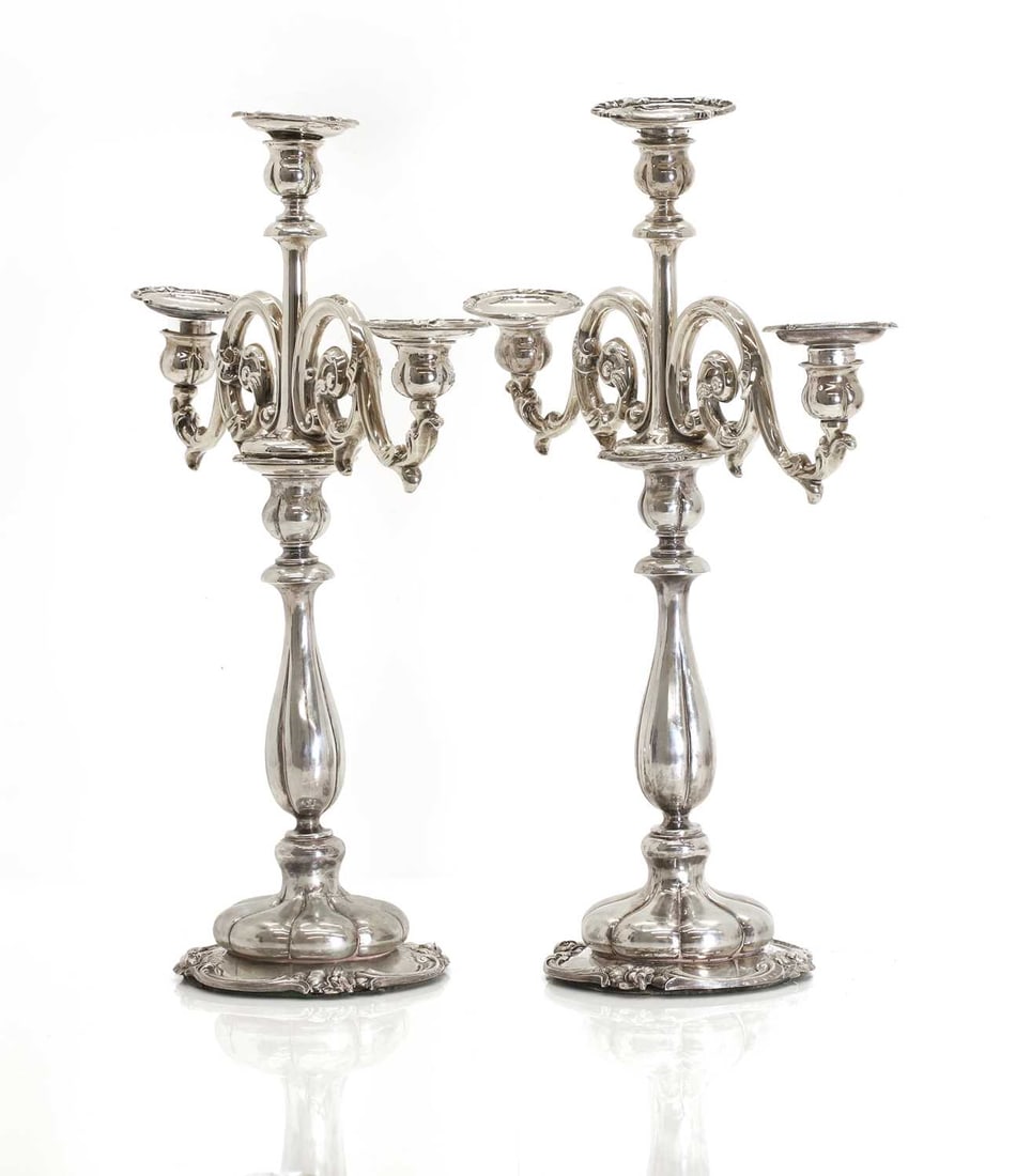 A pair of Dutch .833 standard silver three-light candelabra, - 2