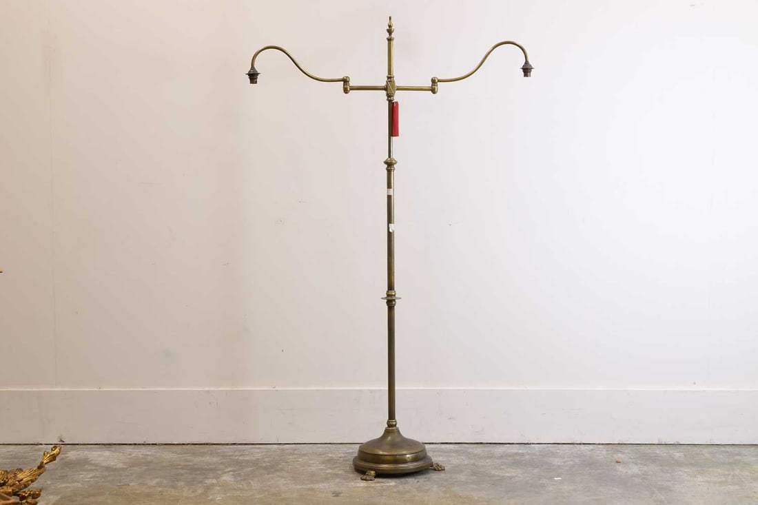 A brass twin branch extendable standard lamp, 20th century, - 2