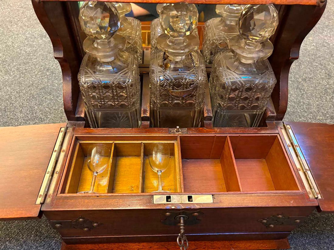 An oak travelling tantalus with games compartment early 20th century, - 10