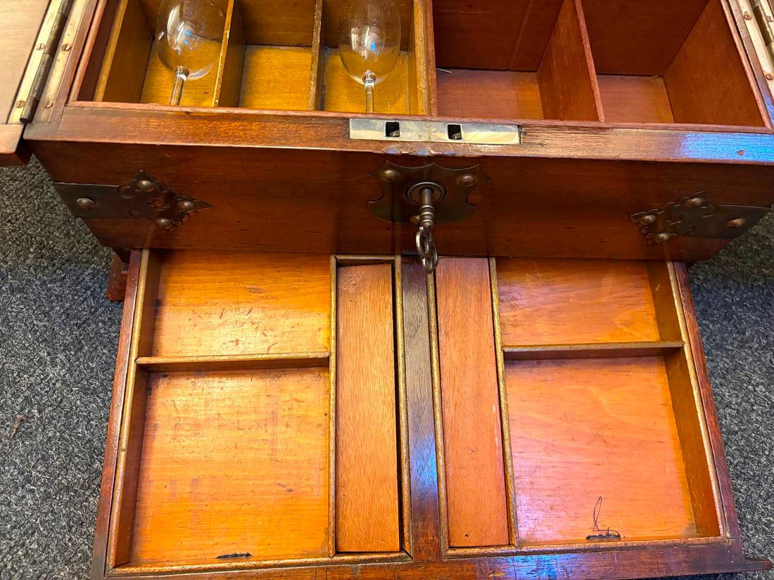 An oak travelling tantalus with games compartment early 20th century, - 12