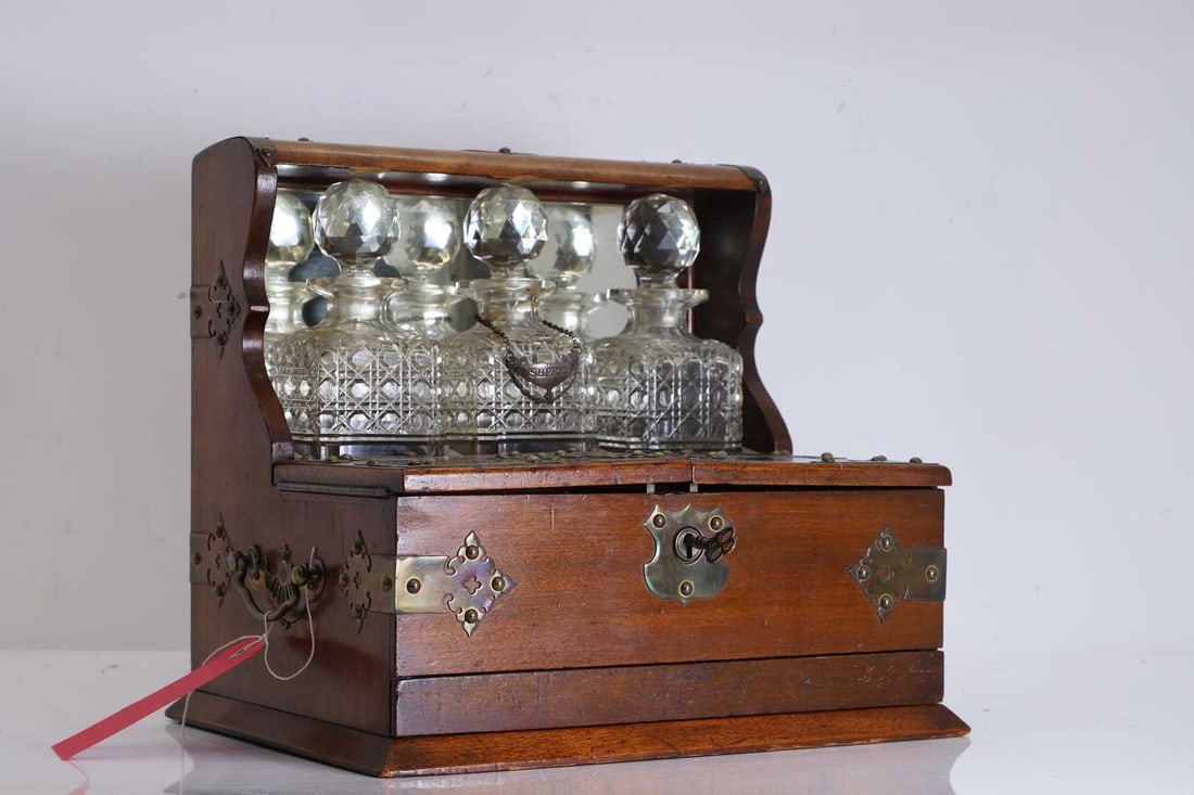 An oak travelling tantalus with games compartment early 20th century, (1 of 1)