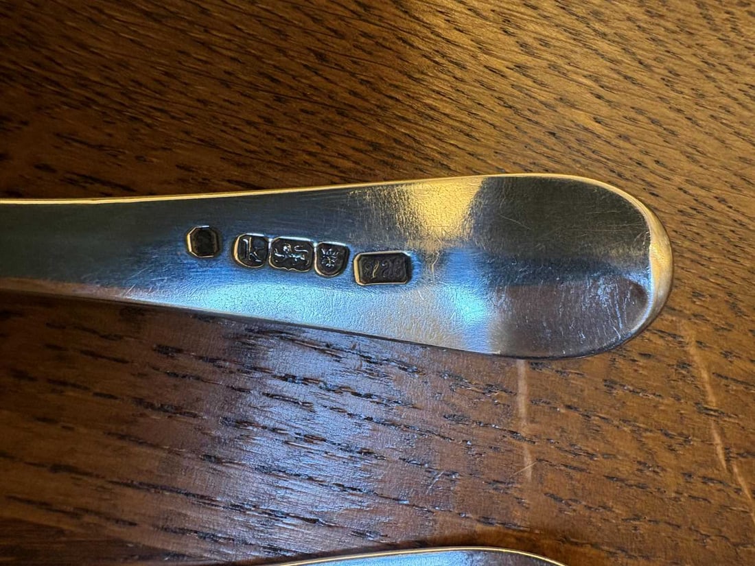 A set of three silver spoons, - 2