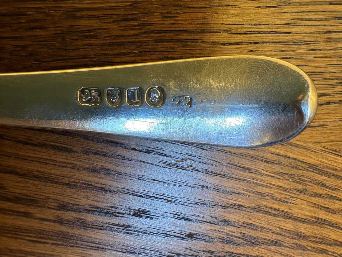 A set of three silver spoons, - 9