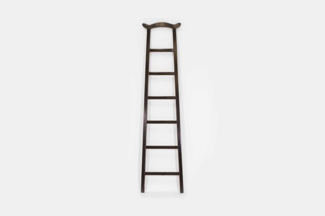 A black-lacquered wooden ladder in the Chinese taste, of recent manufacture, (1 of 3)